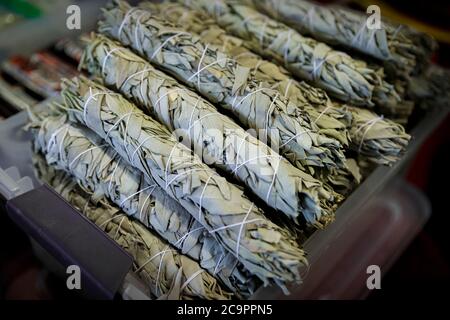 Traditional Native American Indian ritual white sage smudge sticks on display for sale at a powwow, San Francisco Stock Photo
