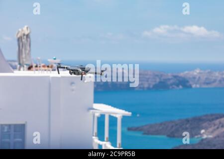 Drone with cityscape of Santorini. Stock Photo
