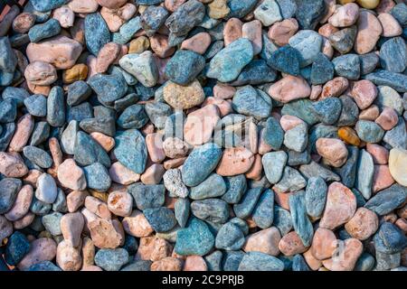 Abstract nature pebbles background. Blue pebbles texture. Stone background. Blue vintage color. Sea pebbles beach. Beautiful nature. Turquoise color Stock Photo
