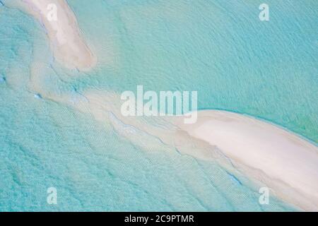 Sandbank in Maldives with crystal clear beautiful water and white sand. Paradise landscape, soft white sand, blue lagoon sea, ripples Stock Photo