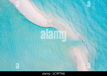 Sandbank in Maldives with crystal clear beautiful water and white sand. Paradise landscape, soft white sand, blue lagoon sea, ripples Stock Photo