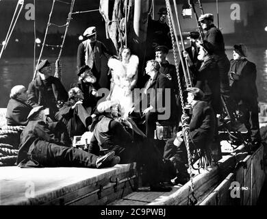 JESSIE MATTHEWS singing with London Bargemen in SAILING ALONG 1938 director SONNIE HALE Gaumont British Picture Corporation Stock Photo