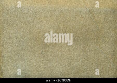 A brown beige cloth-like paper surface, macro shot Stock Photo