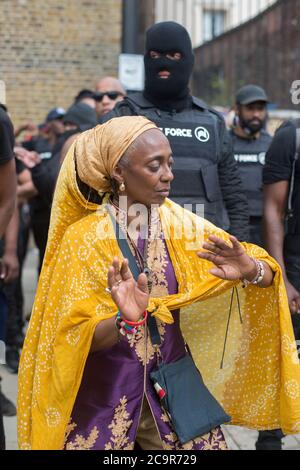 Hundreds join the Afrikan Emancipation Day celebration on Windrush Square, Brixton. As roads were temporary blocked has part of the 'Lockdown Brixton'. Stock Photo