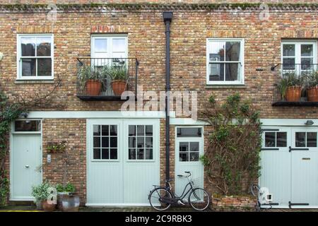 Bicycle parking in front of a residential house in London, UK. Block of London houses. English architecture. Elegant apartment building. Real estate c Stock Photo