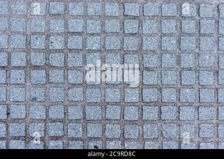 Grey old grunge square pavement texture in Valencia, Spain Stock Photo