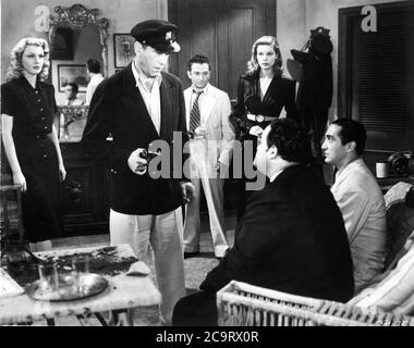 DOLORES MORAN HUMPHREY BOGART MARCEL DALIO LAUREN BACALL DAN SEYMOUR and SHELDON LEONARD in TO HAVE AND HAVE NOT 1944 director HOWARD HAWKS novel ERNEST HEMINGWAY screenplay JULES FURTHMAN and WILLIAM FAULKNER Warner Bros. Stock Photo