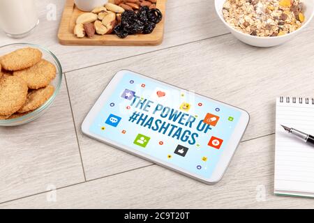 Healthy Tablet Pc compostion with THE POWER OF #HASHTAGS inscription, Social networking concept Stock Photo