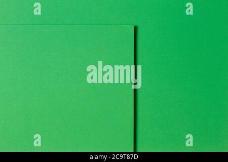 Abstract green monochrome creative paper texture background. Minimal geometric shapes and lines Stock Photo