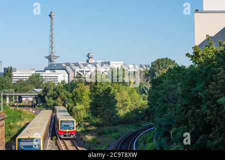 Berlin radio tower with ICC and a moving S-Bahn in landscape format Stock Photo