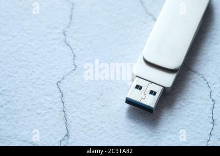 USB memory stick on white background, close up. Stock Photo