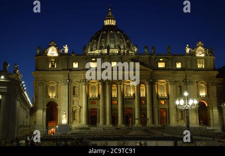 St. Peter's Basilica on St. Peter's Square by night in the city of Rome, Italy Stock Photo