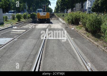 Berlin, Germany. 31st July, 2020. Construction work on the tracks of the M10 tram line near Landsberger Allee. The tracks of the M10 tram line between Landsberger Allee and Bersarinplatz are being renewed. Rail traffic is interrupted in this area until October. Credit: Alexandra Schuler/dpa/Alamy Live News Stock Photo