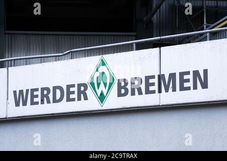 Bremen, Germany - July 22, 2018: Werder Bremen sign on a wall at the weser stadium. Werder Bremen is a German sports club Stock Photo