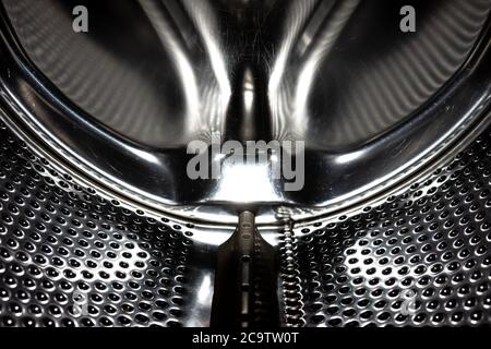 Inside view of an empty washing machine drum Stock Photo