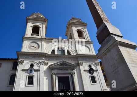 Chiesa di Trinita dei Mont and Obelisco Sallustianoi on the top of the Spanish Steps in the city of Rome, Italy Stock Photo