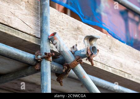 a close up of scaffolding poles on a building site using selective focus Stock Photo