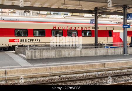 Lugano, Ticino, Switzerland - February 19, 2020: Swiss Federal Railways (SBB) train at the Lugano Railway Station platform. Stock Photo