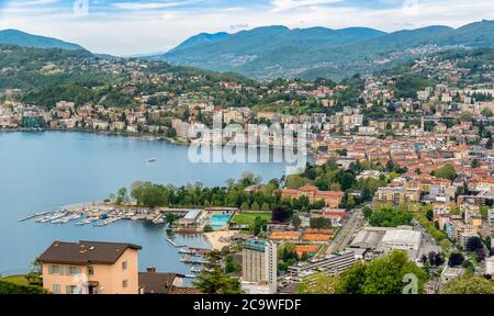 Panoramic view of Lugano city on the shore of Lake Lugano, Ticino, Switzerland Stock Photo