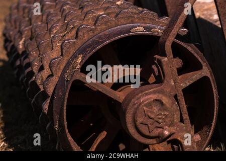 Closeup of a rusty old roller farm equipment Stock Photo