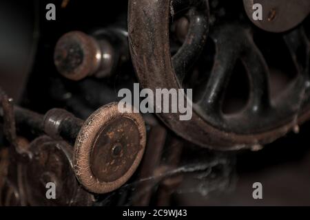 Closeup of the wheel on an old vintage sewing machine Stock Photo