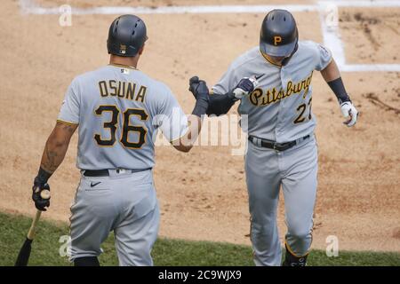 Chicago, United States. 02nd Aug, 2020. Pittsburgh Pirates shortstop Kevin Newman (27) celebrates with third baseman Jose Osuna (36) after hitting a solo home run against the Chicago Cubs in the first inning at Wrigley Field on Sunday, August 2, 2020 in Chicago. Photo by Kamil Krzaczynski/UPI Credit: UPI/Alamy Live News Stock Photo