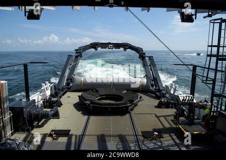 Pensacola, United States of America. 02 August, 2020. The SpaceX GO Navigator recovery ship prepares for the splash down of the SpaceX Crew Dragon Endeavour spacecraft returning from the International Space Station in the Gulf of Mexico August 2, 2020 off the coast of Pensacola, Florida. The Demo-2 test flight for the NASA Commercial Crew Program carried astronauts Robert Behnken and Douglas Hurley to the International Space Station and return them safely to Earth onboard a commercially built and operated spacecraft. Credit: Bill Ingalls/NASA/Alamy Live News Stock Photo