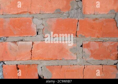 Background from red bricks close-up. Brick wall texture. High quality photo Stock Photo