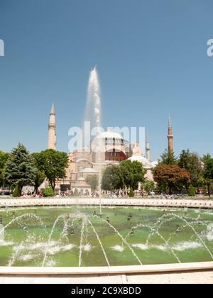 Hagia Sophia and colorful fountain in Sultanahmet park, Istanbul ...