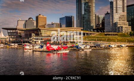 Sunset over the Float Plane Terminal at the shore of Burrard Inlet in Downtown Vancouver Stock Photo