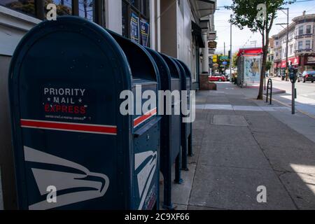 Post Office boxes such as these ones in San Francisco, CA, USA help people correspond with each other. Stock Photo