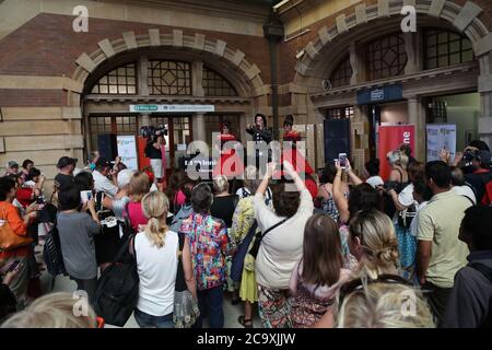 An Elvis impersonator entertains the crowds at Central Station in Sydney before the departure of the NSW Trainlink Elvis Express train to Parkes. Stock Photo