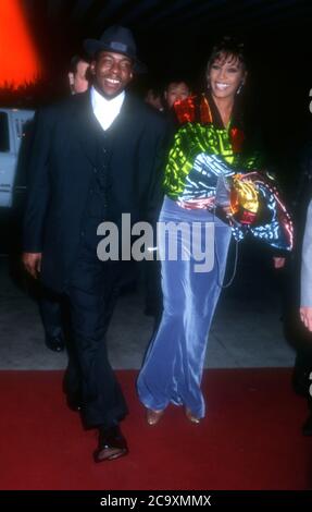 Beverly Hills, California, USA 27th February 1996 Singer Bobby Brown and singer Whitney Houston attend the 38th Annual Grammy Awards Pre-Party Hosted by Clive Davis on February 27, 1996 at Beverly Hills Hotel in Beverly Hills, California, USA. Photo by Barry King/Alamy Stock Photo Stock Photo