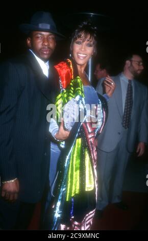 Beverly Hills, California, USA 27th February 1996 Singer Bobby Brown and singer Whitney Houston attend the 38th Annual Grammy Awards Pre-Party Hosted by Clive Davis on February 27, 1996 at Beverly Hills Hotel in Beverly Hills, California, USA. Photo by Barry King/Alamy Stock Photo Stock Photo