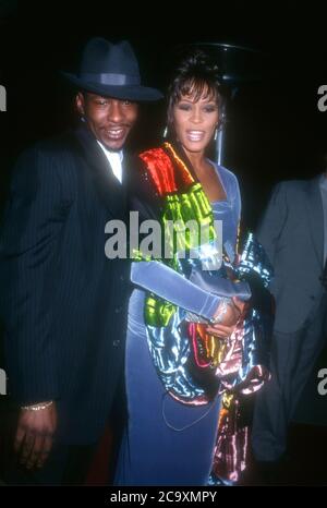 Beverly Hills, California, USA 27th February 1996 Singer Bobby Brown and singer Whitney Houston attend the 38th Annual Grammy Awards Pre-Party Hosted by Clive Davis on February 27, 1996 at Beverly Hills Hotel in Beverly Hills, California, USA. Photo by Barry King/Alamy Stock Photo Stock Photo