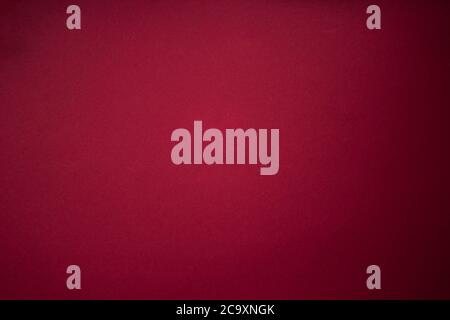 Burgundy Red Striped Paper Texture Background. Purple red grunge wall background with dark spots Stock Photo