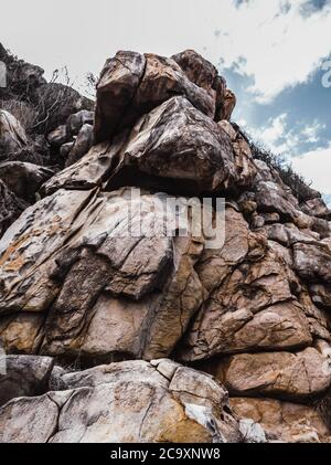 Strange Large Rocks Huge yellow strange stone and sea. Alien planet landscape, rock ...