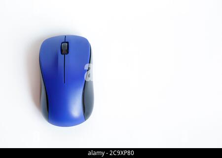 View of a blue wireless mouse on white background,  with copy space Stock Photo