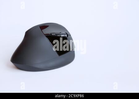 View of a black wireless mouse on white background,  with copy space Stock Photo