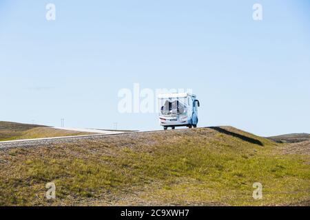 A travel caravan aka camper van vehicle on the scenic road to North ...