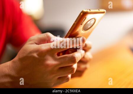 Close-up of a person using a mobile phone Stock Photo
