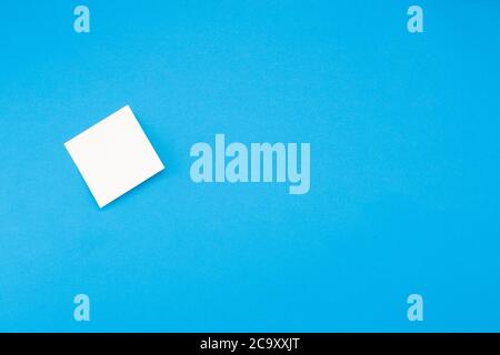 Blank sticker isolated on blue background with place for text Stock Photo