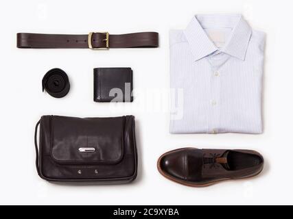 Men's casual outfits for man clothing with brown shoes , belt, , shirt, wallet and bag Stock Photo