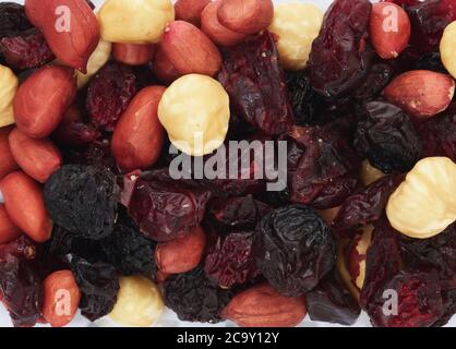 a close up macro shot of a mixture of dried fruits and nuts Stock Photo