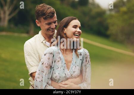 Couple in love at the park. Loving couple spending time together at the park. Stock Photo