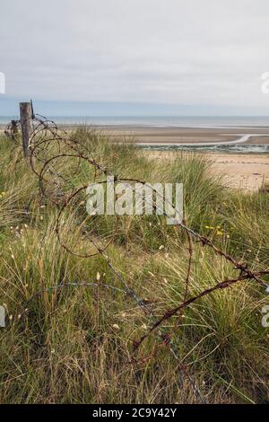 Relics from the World War II D-Day Landings - barbed wire on Utah Beach, Normandy, France Stock Photo