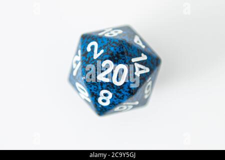 A nat 20 is rolled on a 20 sided dice used for agmes of Dungeons & Dragons, a popular tabletop roleplaying game. Stock Photo