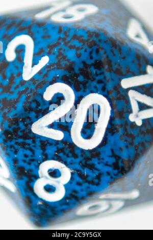 A nat 20 is rolled on a 20 sided dice used for agmes of Dungeons & Dragons, a popular tabletop roleplaying game. Stock Photo