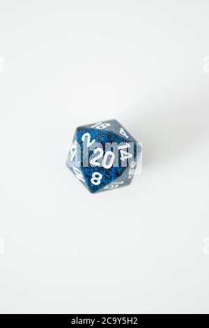 A nat 20 is rolled on a 20 sided dice used for agmes of Dungeons & Dragons, a popular tabletop roleplaying game. Stock Photo