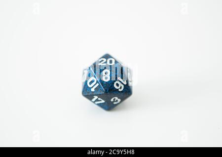 A nat 20 is rolled on a 20 sided dice used for agmes of Dungeons & Dragons, a popular tabletop roleplaying game. Stock Photo